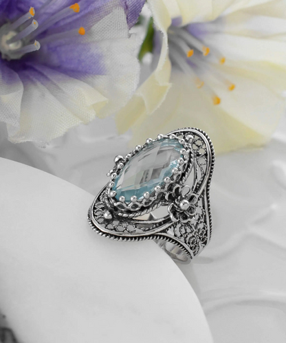 FiligranIst - Blue Topaz Sterling Silver Statement Ring with Daisy Accents